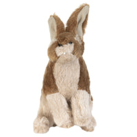 The Hyper Pet Wildlife Rabbit Dog Toy With Squeaker by Hyperpet features soft brown and beige fur, long ears, and a bushy tail. Perfect for pet parents seeking a cuddly playmate for their furry friends, its positioned sitting upright against a white background.