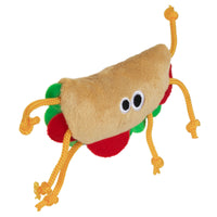 The Mad Cat Tabby Taco Catnip & Silvervine Cat Toy is a plush taco cat toy with cartoon eyes, yellow rope limbs, and fabric resembling lettuce and tomato. Its infused with catnip for added feline enjoyment.