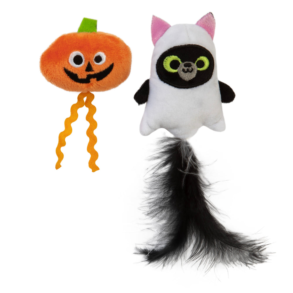 The Mad Cat Hiss & Haunt Plush Cat Toy features two Halloween-themed toys: a smiling orange pumpkin with curly yellow ribbons and a black cat in a ghost costume with pink-eared hood, stuffed with silvervine and catnip for extra fun, plus a long black feather tail.