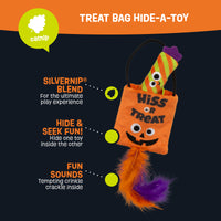 The Mad Cat Treat Bag Hide-A-Toy, featuring a Hiss or Treat smiling design, is an orange Halloween-themed bag infused with SILVERNIP® blend and catnip. It includes a colorful striped toy, offering crinkle sounds and hide-and-seek fun for endless feline entertainment.