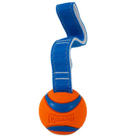 The Chuckit! Ultra Tug Dog Toy by Chuckit is an orange and blue durable rubber ball labeled Chuckit! attached to a sturdy blue strap, ideal for fetch or tug-of-war with dogs.