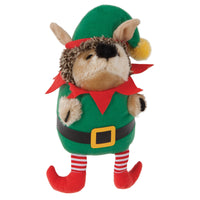 The Zoobilee Elf Heggie Dog Toy by Zoobilee is a plush dog toy in a green elf costume, with a red collar, black belt, yellow buckle, red and white striped legs, elf shoes, and a fluffy face with pointy ears through an elf hat. It entertains dogs with amusing grunting sounds.