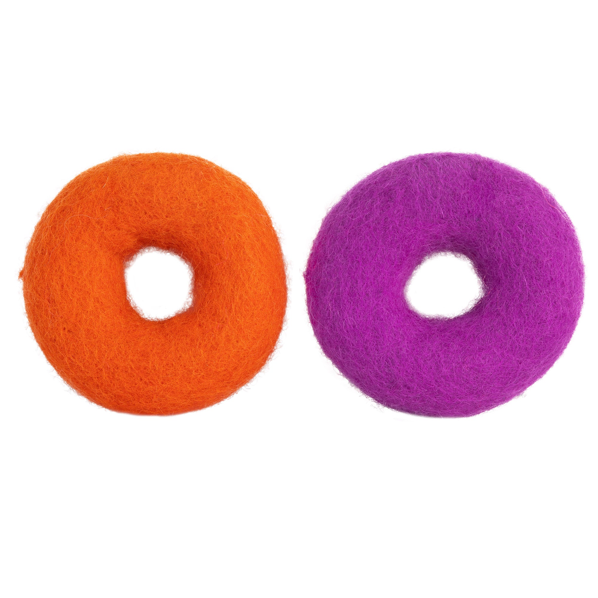 The Mad Cat Wacky Wool Rings feature two round felted wool donuts, one orange and one purple, each with a hole in the center. Crafted from natural wool, these delightful cat toys are perfect for infusing with catnip and silvervine to entertain your feline friend.