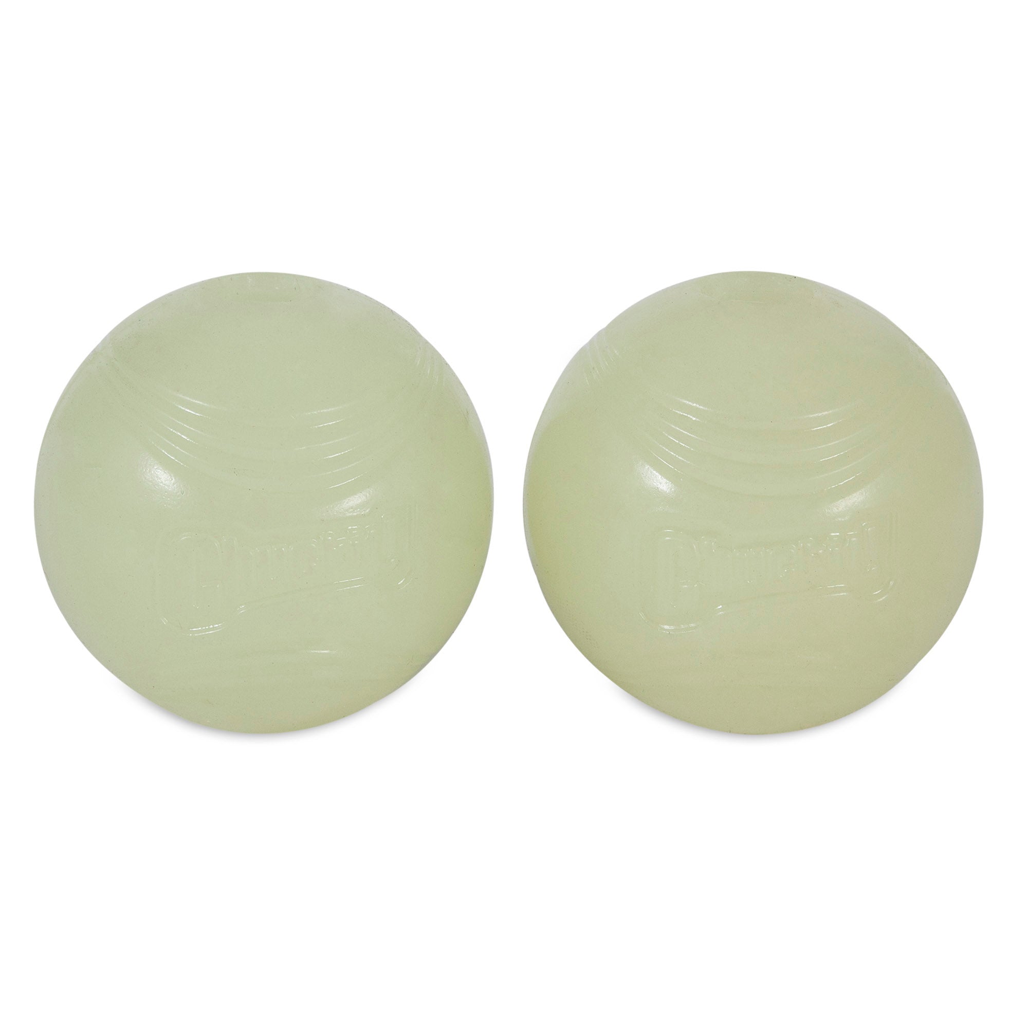 Two translucent, pale green round objects with a smooth surface are side by side against a white background. They resemble the durable rubber Chuckit! Max Glow Fetch Ball by Chuckit, appearing similar in size and texture.