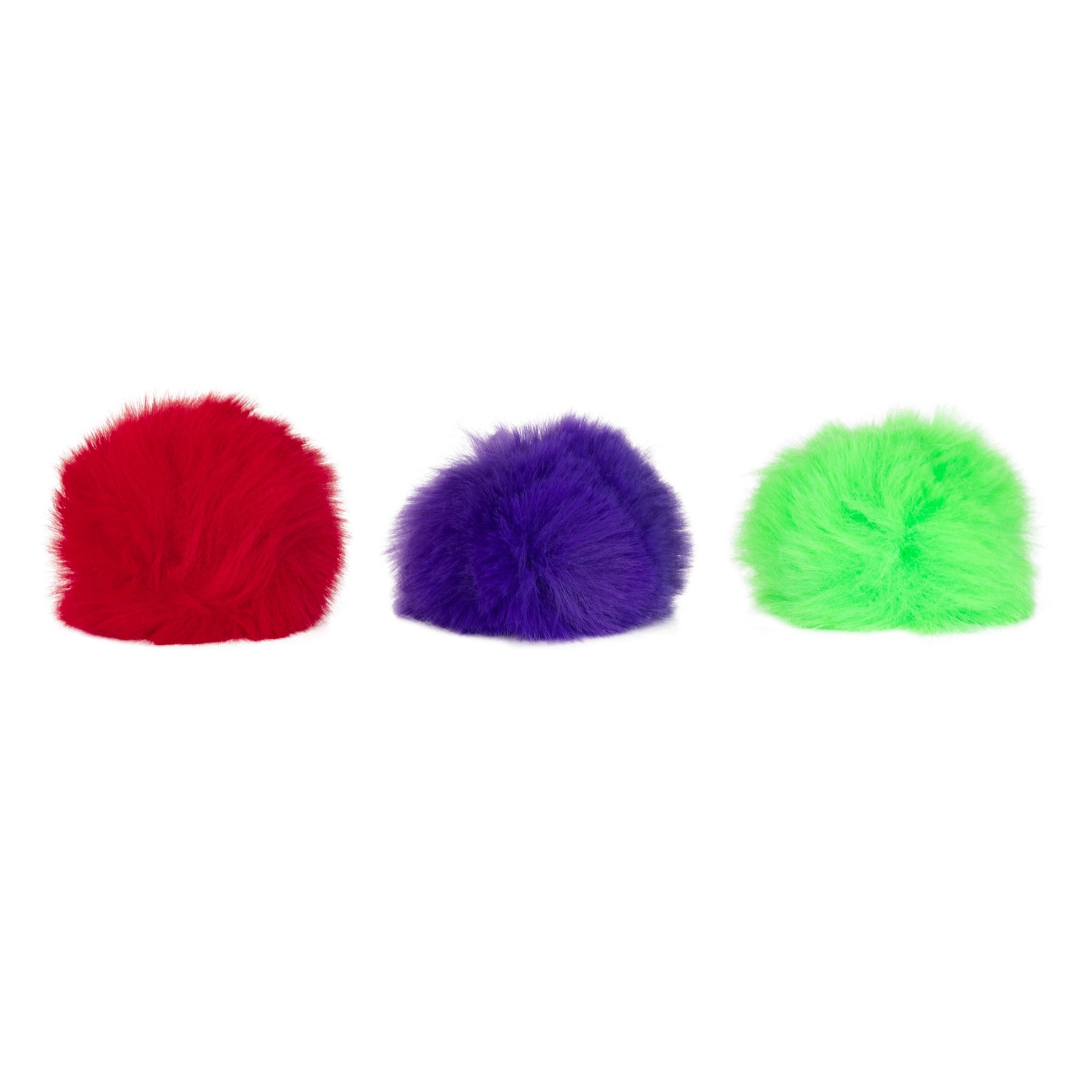 Three Mad Cat Fuzzy Fluffs Catnip Toys lined up against a white background, with the pom-poms colored red, purple, and green from left to right.