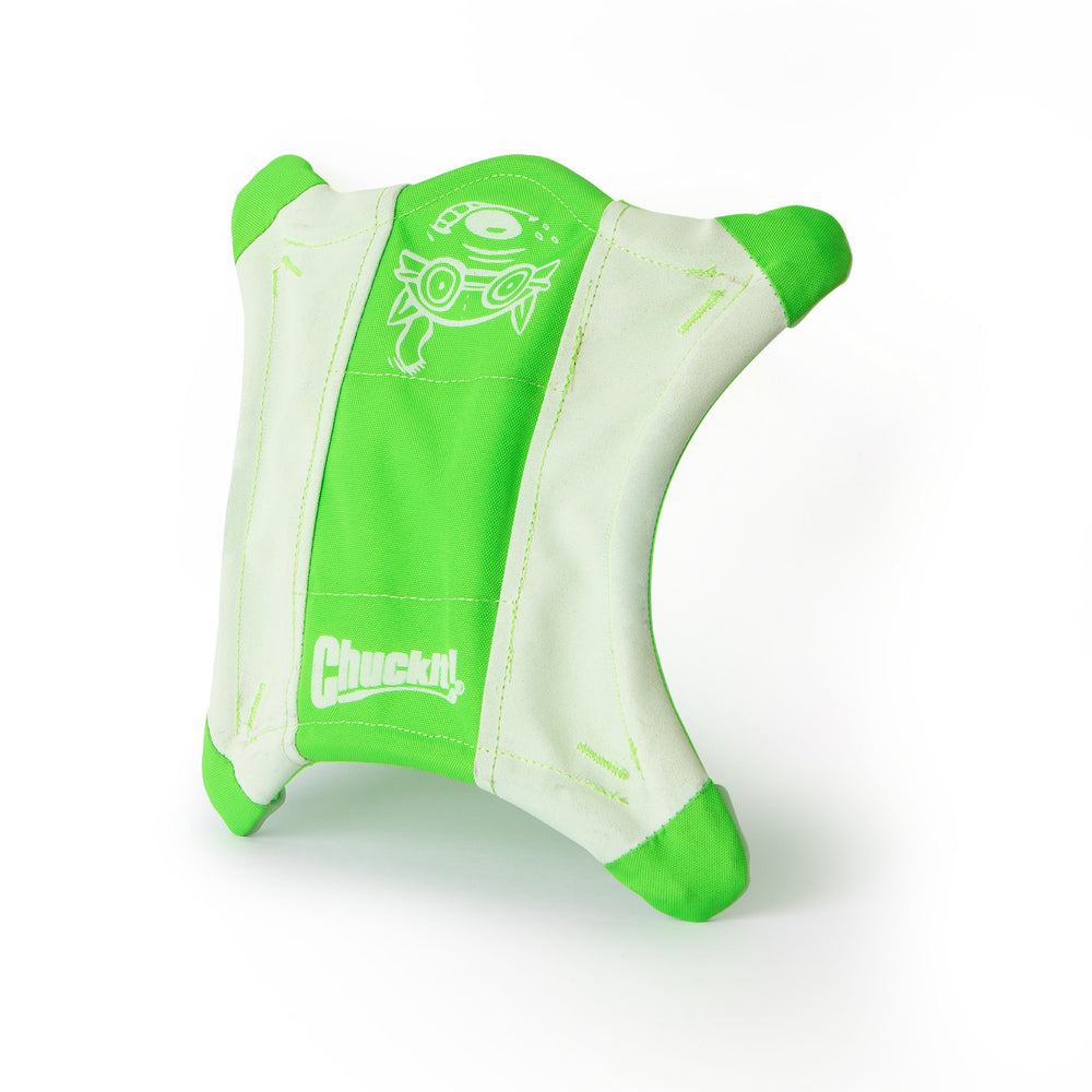 The Chuckit! Max Glow Squirrel by Chuckit is a green and white fabric dog toy made from durable canvas with rounded corners, stitched details, dog and tennis ball illustrations, and Chuckit! printed on one side. Its soft and flexible texture makes it ideal for playtime fun.