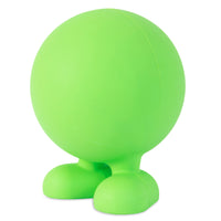 The JW Cuz Dog Toy from Jw is a bright green, round figure crafted from natural rubber. It stands upright on two large feet and resembles a playful cartoon character, exuding an inviting charm against the plain white background.