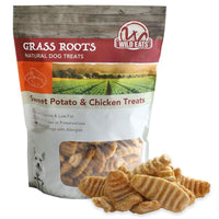 A bag of Wild Eats Sweet Potato Treats, made with USA-sourced ingredients, showcases farm imagery and is low in calories, supports digestive health, and suits dogs with allergies. Some treats are scattered in front of the bag.