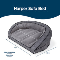 The La-Z-Boy Harper Smoke Sofa offers a plush design for pets, with outer dimensions of 45x35 inches and a sleep area of 31x34 inches. It features Comfort Select fiber-fill and a machine washable cover, combining convenience with coziness for your furry friend.