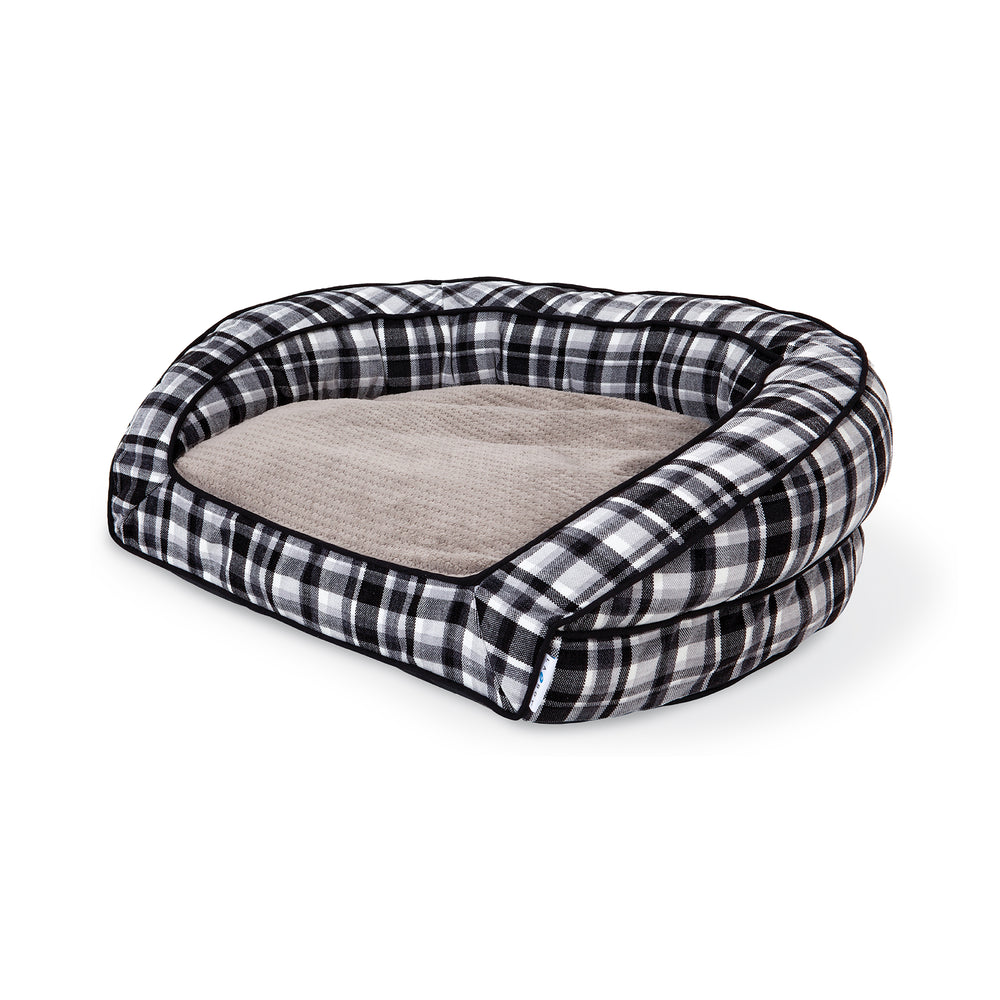 Introducing the La-Z-Boy Tucker Plaid Sofa: a pet bed with high, rounded sides and a soft, beige cushion. Its black and white checkered pattern, filled with ComfortSelect fiberfill, is perfect for medium-sized dogs seeking a cozy spot.