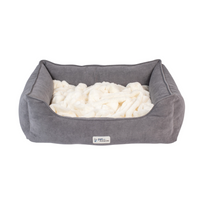 A cozy rectangular gray pet bed with raised sides and a plush cream-colored interior, labeled Pet Fusion Medium Cuddler Bed, features high-walled bolsters for extra comfort, ideal for stylish snuggling.