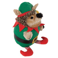 Introducing the Zoobilee Elf Heggie Dog Toy, a charming plush hedgehog dressed as an elf with a green costume, red collar, black belt, red pointy shoes, and striped socks. Its furry face with a black nose makes playful grunting sounds!.