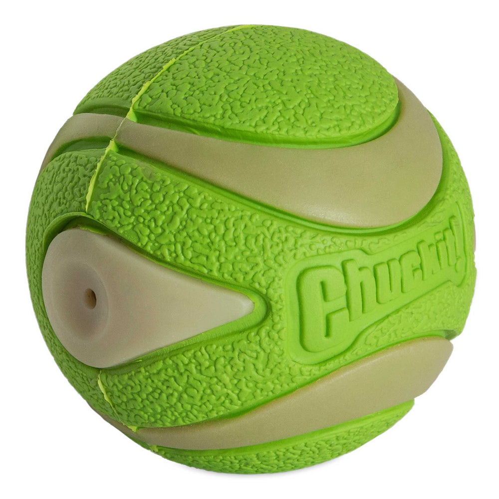 The Chuckit! Max Glow Ultra Squeaker Ball is a textured green rubber ball with beige accents and grooves, ideal for pet play. The word Chuckit! is printed on one side, making it perfect for fetch.