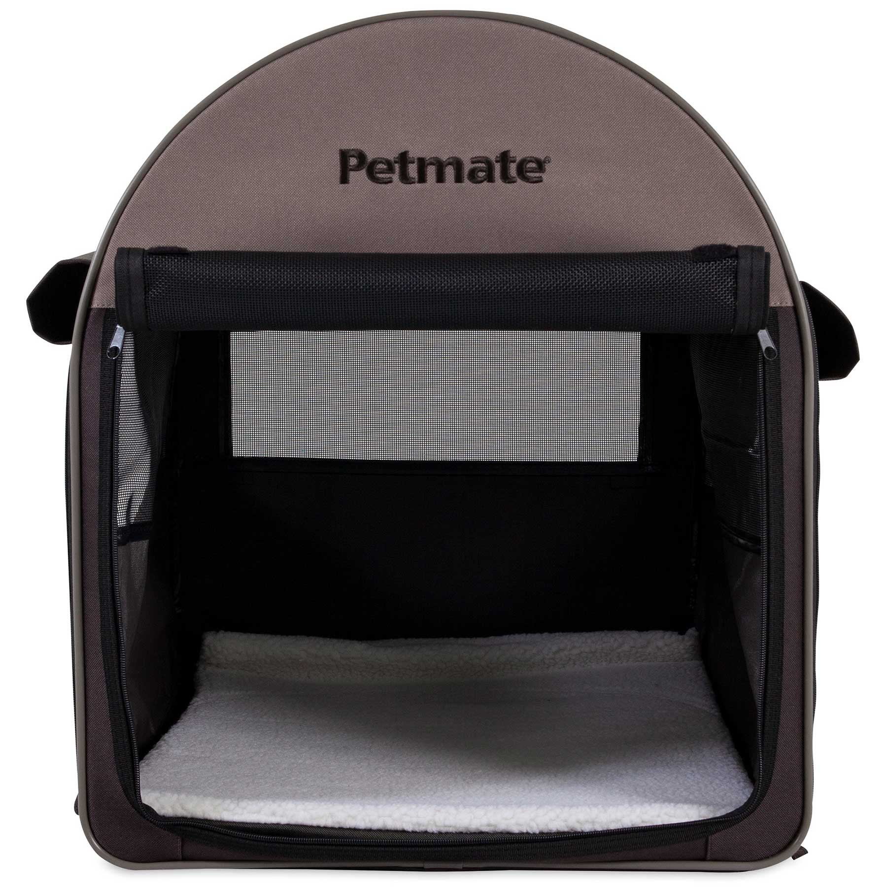 A brown and black Aspen Pet Portable Pet Home features a mesh front opening, a soft white cushion inside, and weather-resistant fabrics. It has side handles for easy transport, with the Aspen Pet logo prominently displayed on the top front of this convenient carrier.